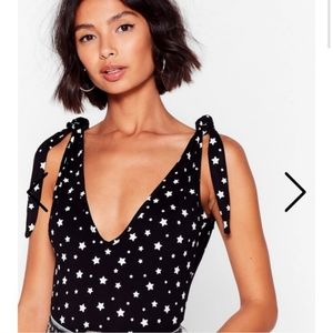 Nasty Gal Black with Star Print Bummy Tie Bodysuit Size 4